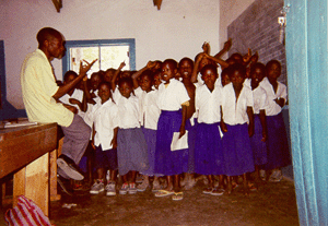 A teacher at Mafuluto primary school teaches using a game.
